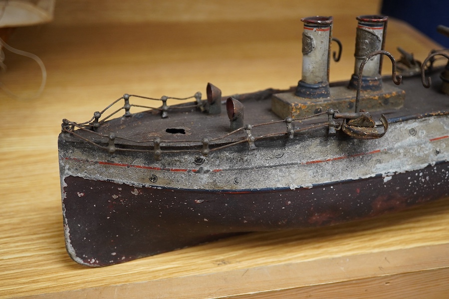 An Ernst Plank for Gamages Ltd clockwork tinplate gun-boat, 40cm in length. Condition - poor.